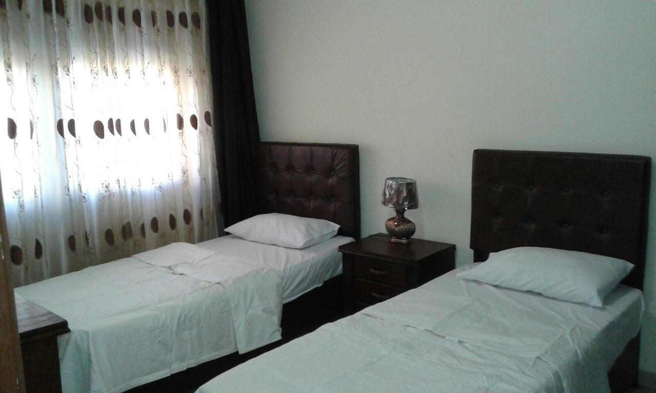 Al Tawheed Hotel Apartments Amman Eksteriør billede