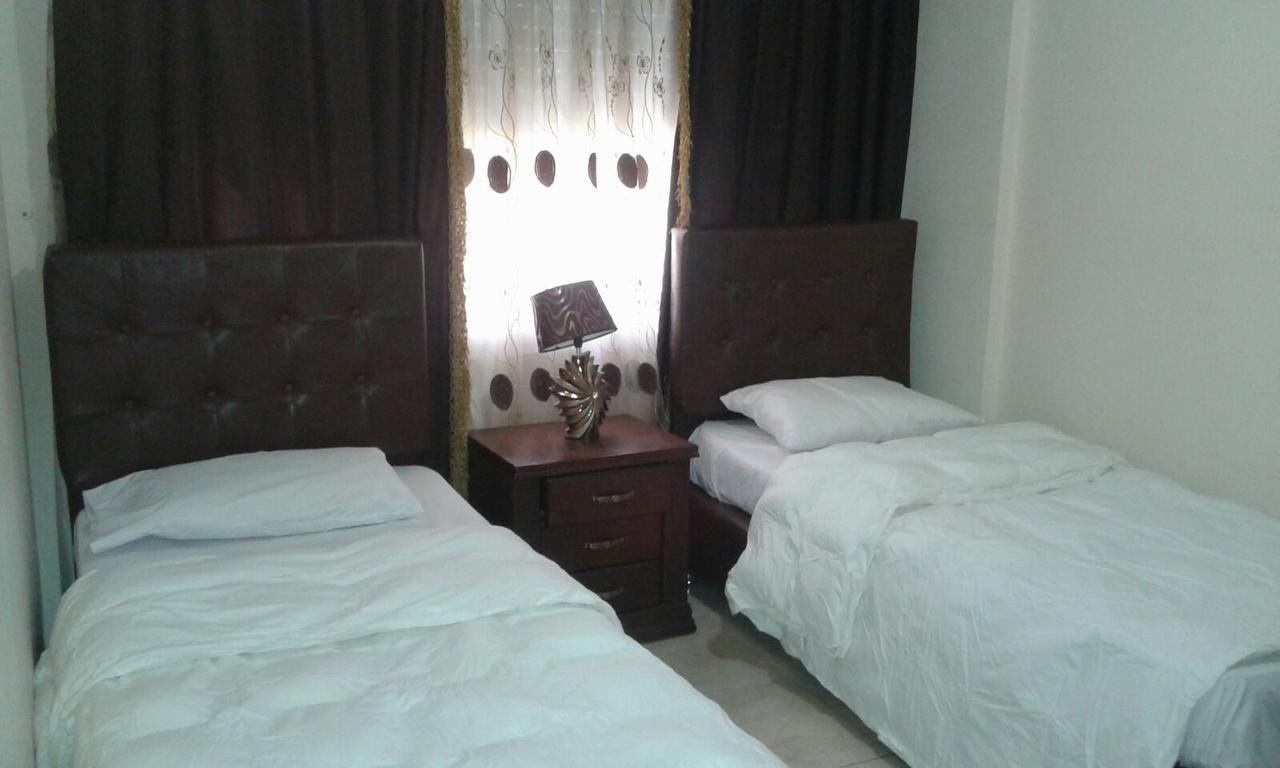 Al Tawheed Hotel Apartments Amman Eksteriør billede
