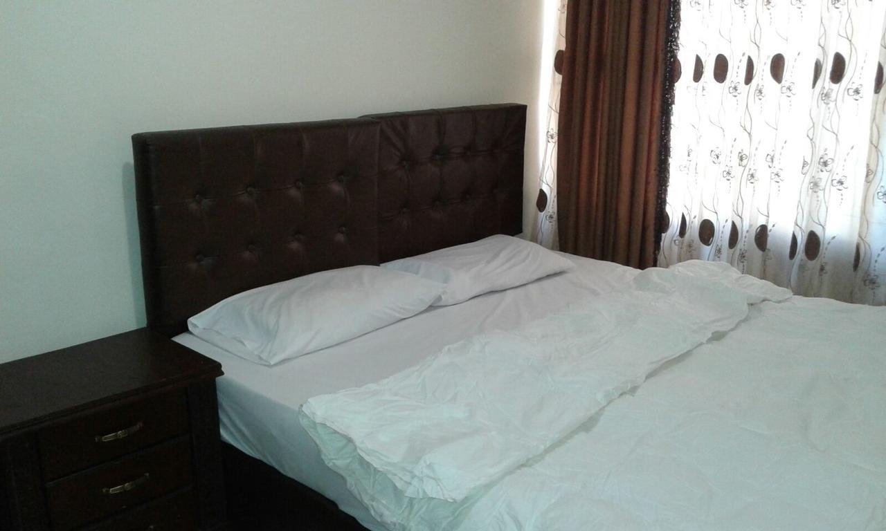Al Tawheed Hotel Apartments Amman Eksteriør billede