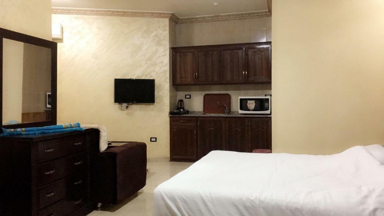 Al Tawheed Hotel Apartments Amman Eksteriør billede